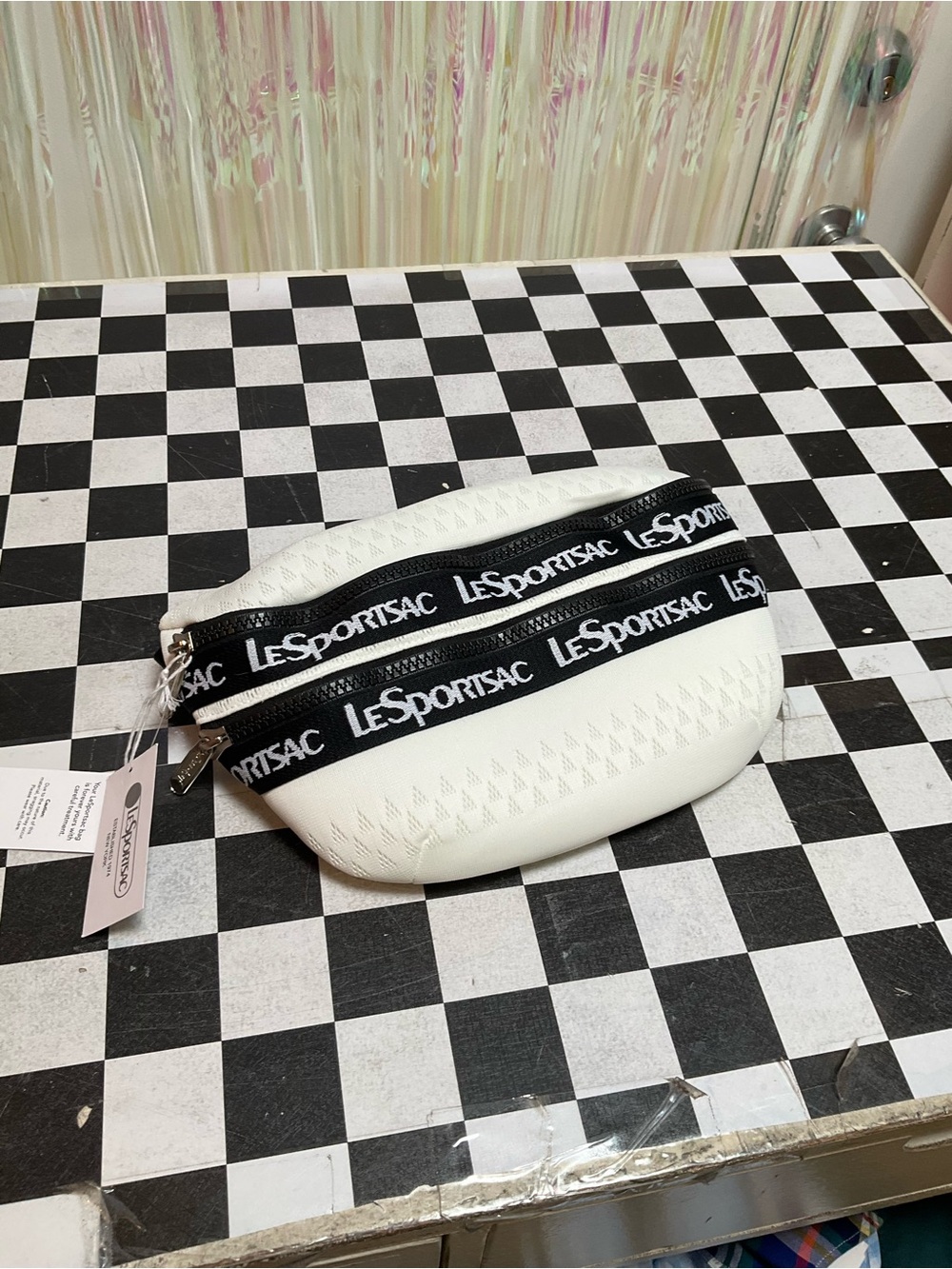 Lesportsac White Crossbody Pouch with Black Logo Straps